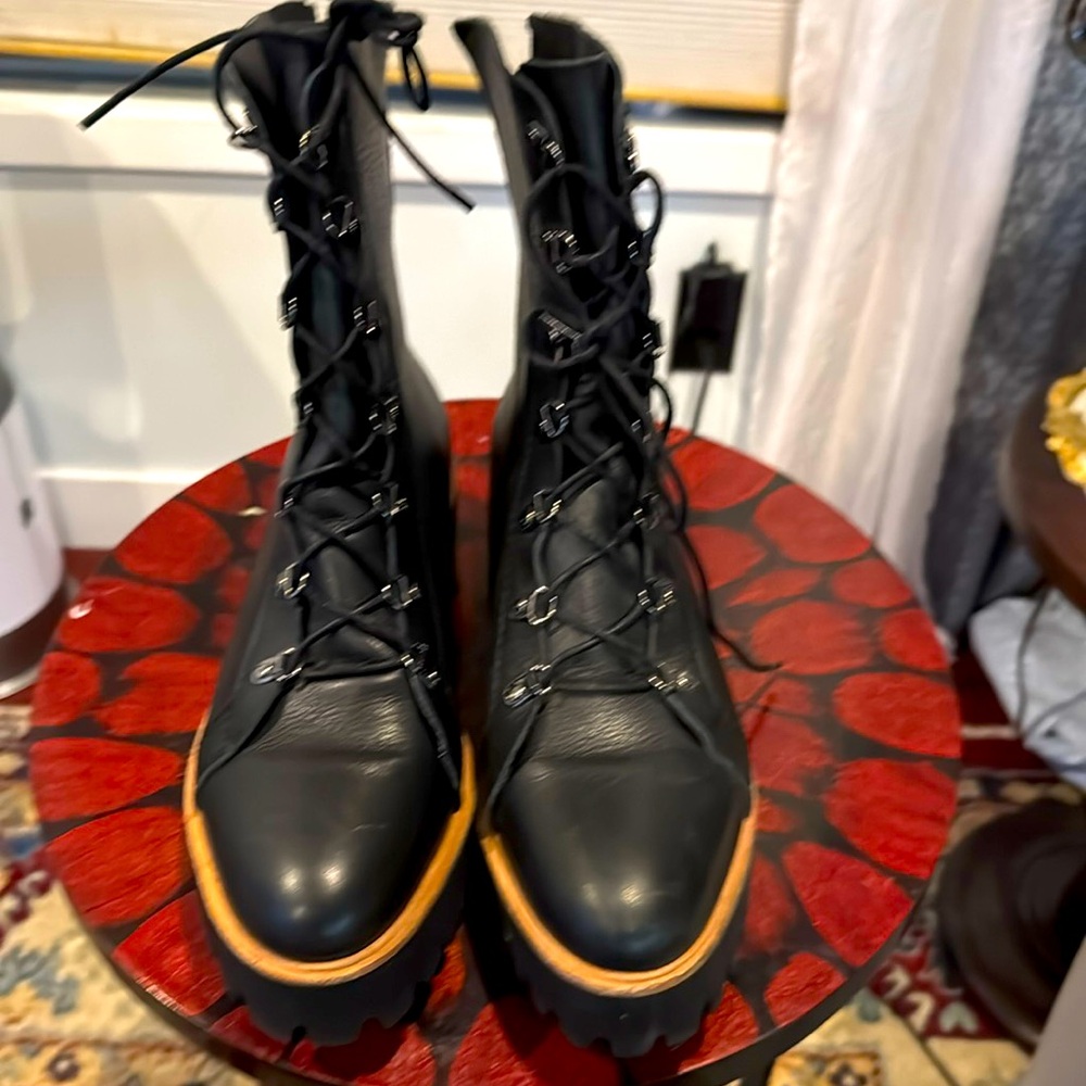 Absolutely gorgeous ALL BLACK platform Boots like new!
